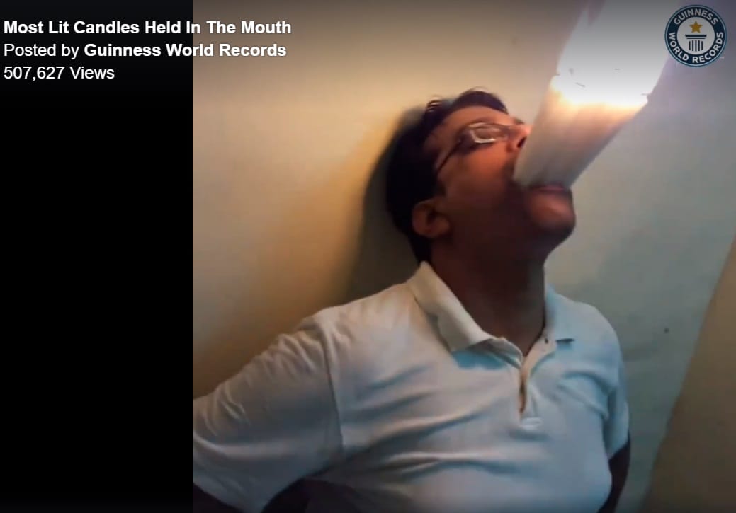 mumbai man made world record for holding twenty two lit candles in mouth