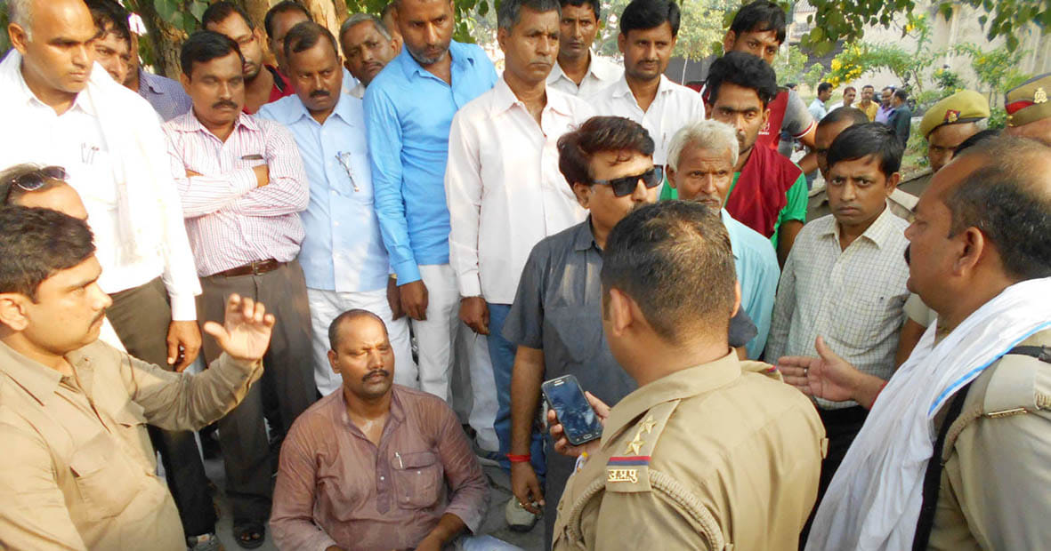 angry teacher trying burn self in front of government office