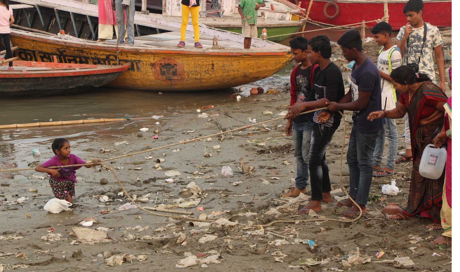 see th photos of minor girl trapped in swamp at  varanasi