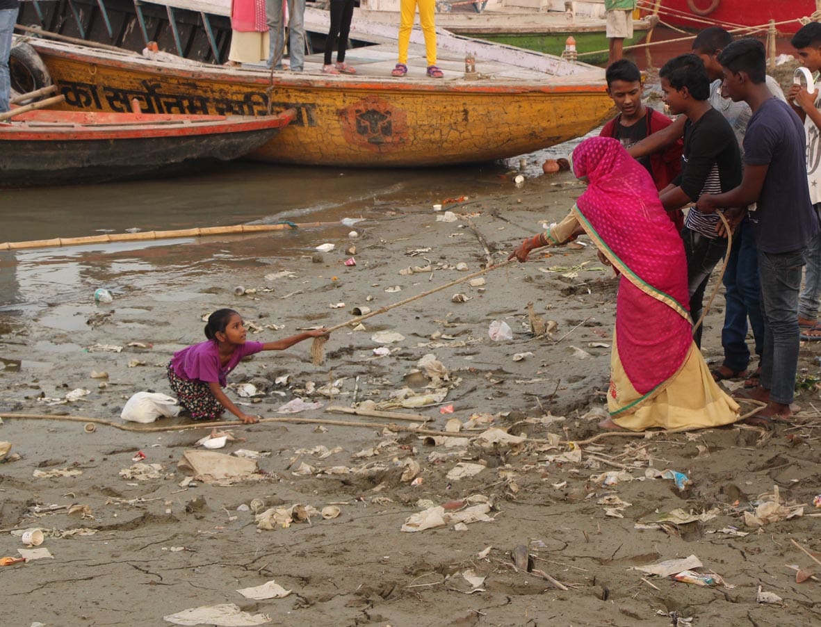 see th photos of minor girl trapped in swamp at  varanasi