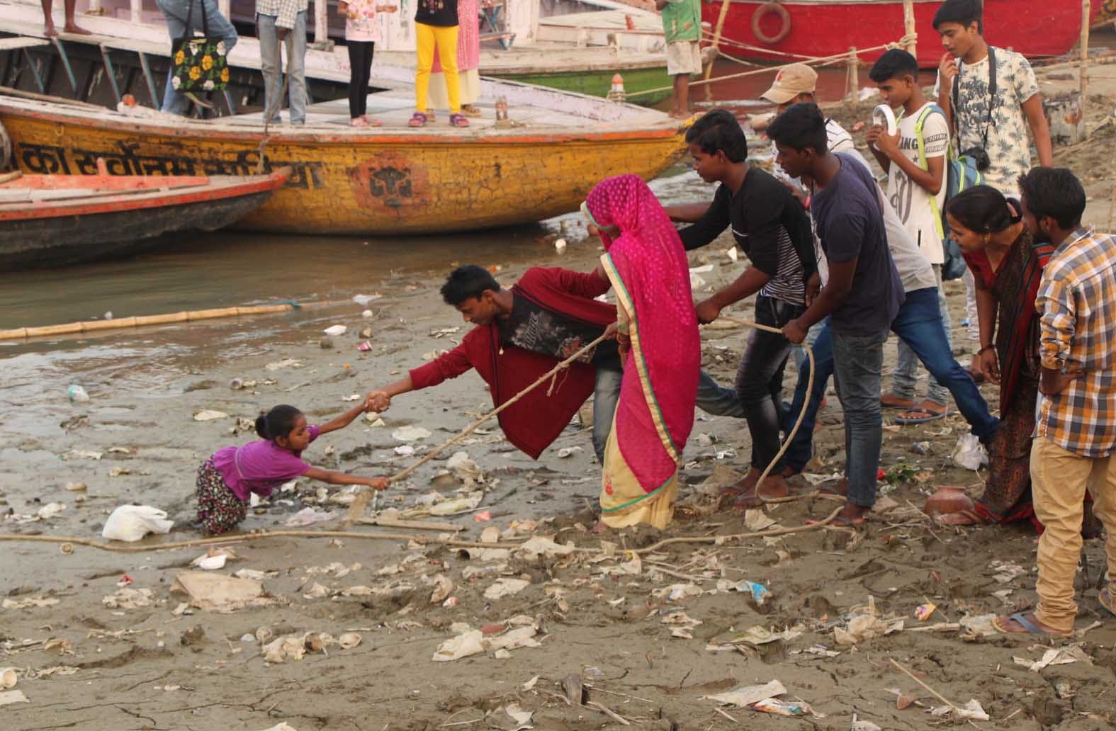 see th photos of minor girl trapped in swamp at  varanasi