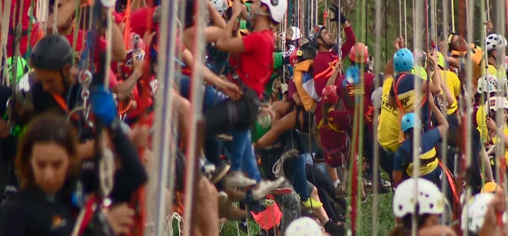 two hundred fourty five people jumped from a bridge together for making record