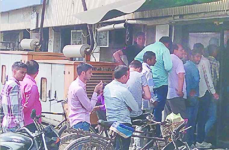 Four days after the open bank, a crowd of customers