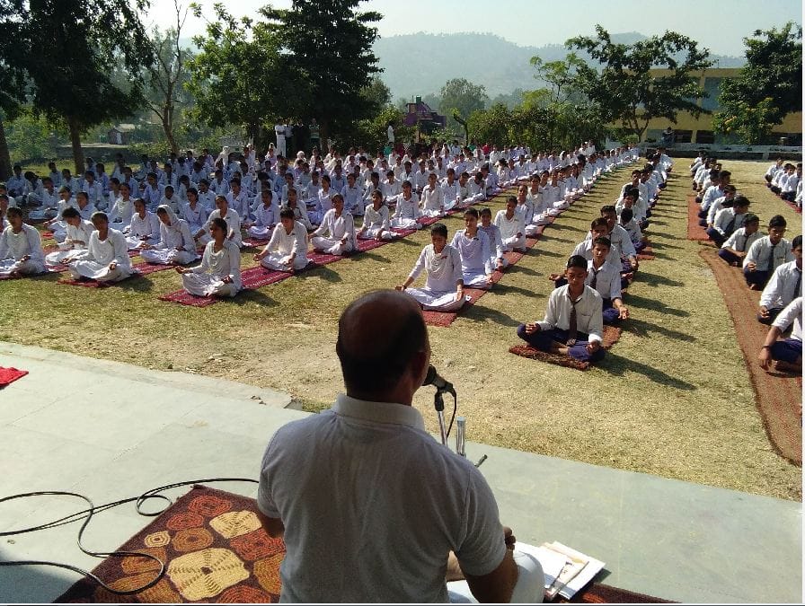 Patanjali Yoga Committee taught students to overcome stress by yoga