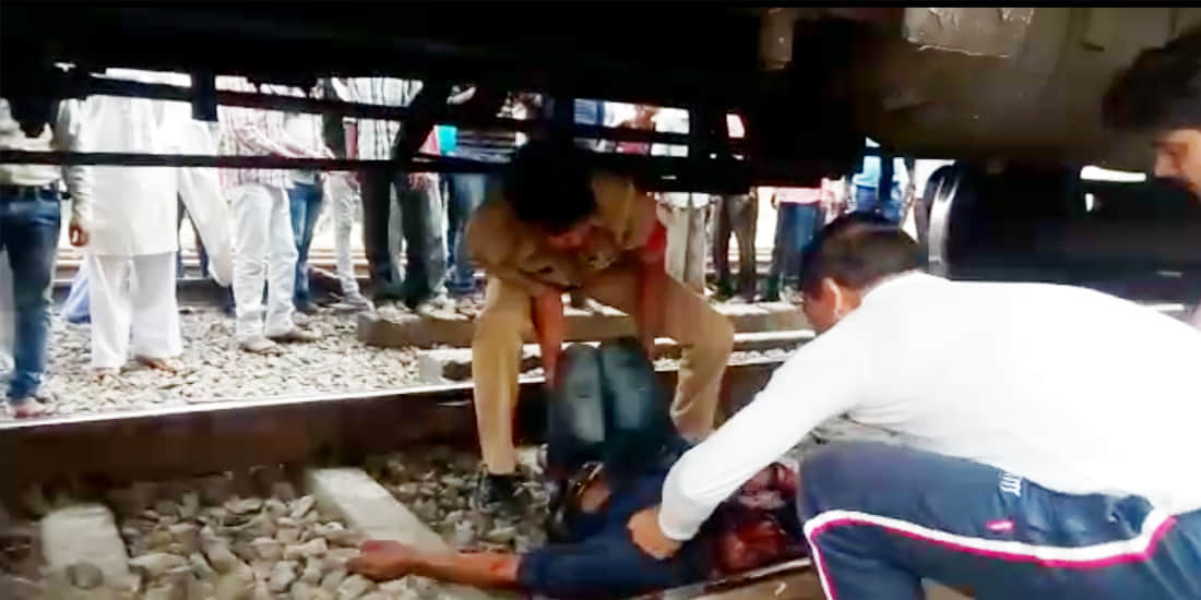 Being clothed with blood and trapped between track