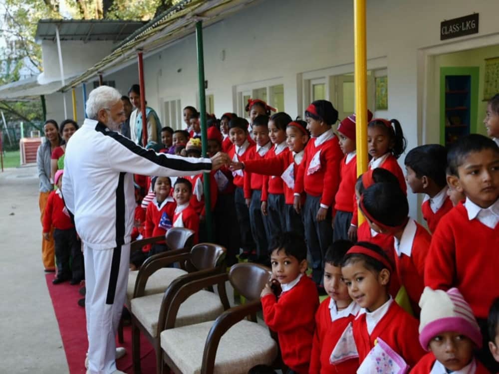 prime minister narendra modi photos with childrens in mussoorie