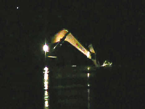 Sand out of the river in the dark of night