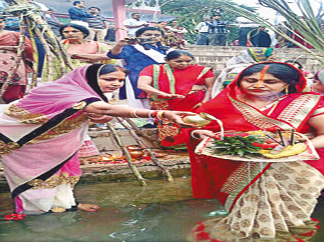 Women on Chhath Puja presented to Sun God