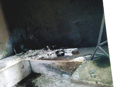 Fire in woods placed in kitchen room