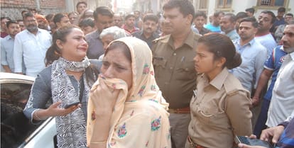 Female teacher lying dead on driving seat in night