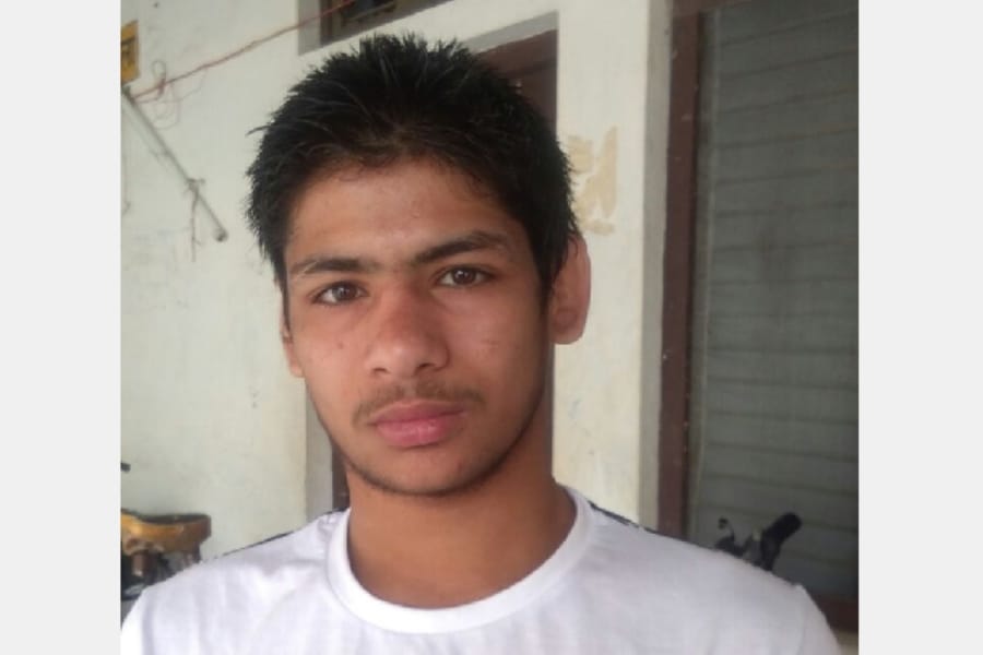 labourer couple's son becomes wrestling champion.