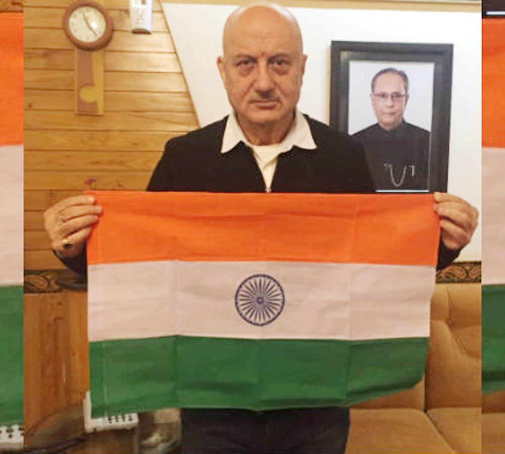 anupam kher said if we can stand in line for cinema tickets then why not for national anthem