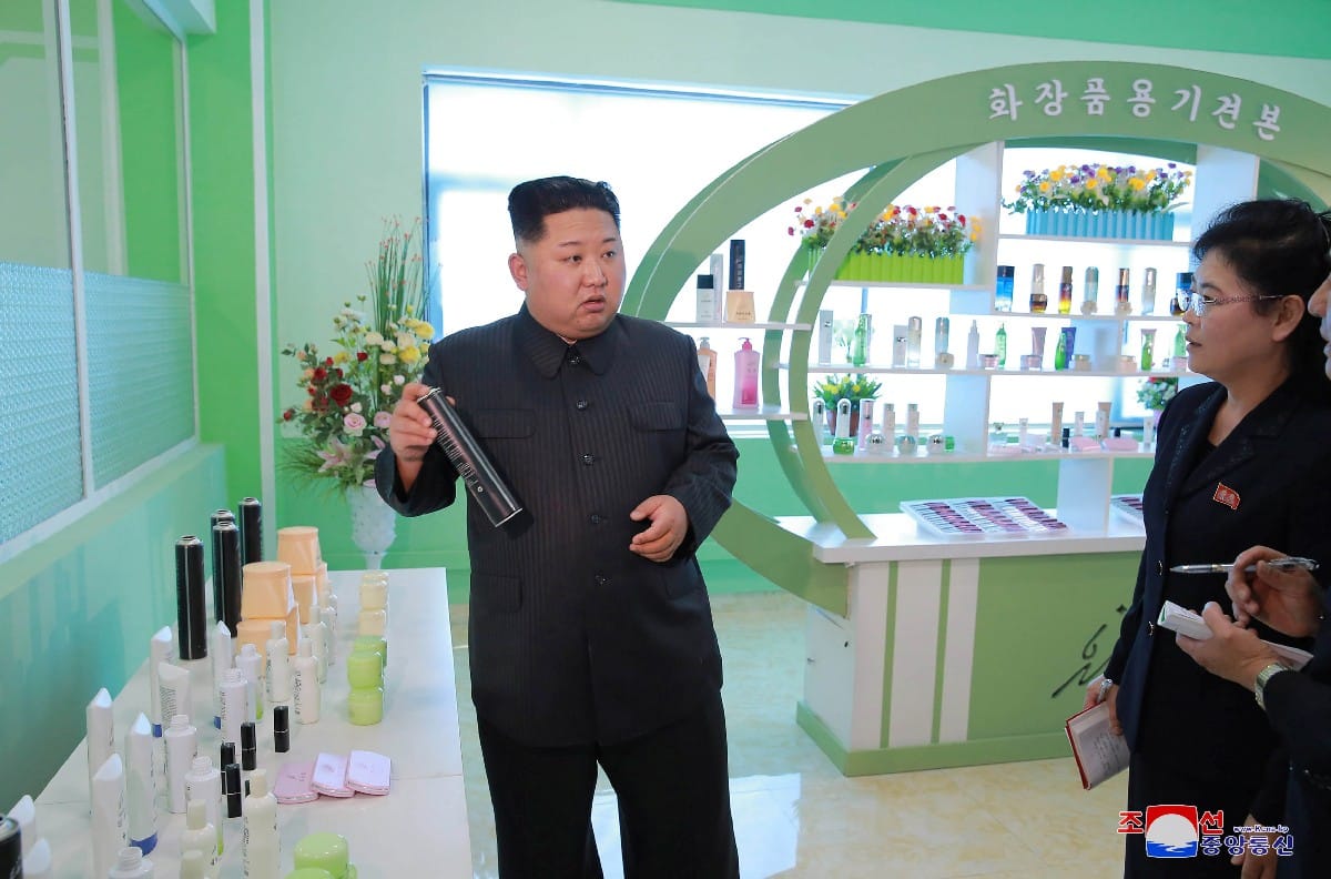 Kim Jong Un appearance with wife at makeup factory in North Korea