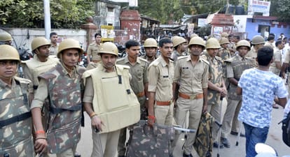 police personnel show pistol to lawyer in varanasi