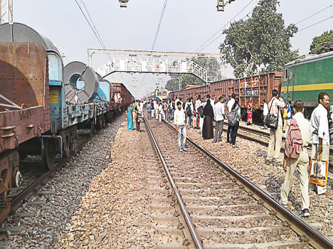 On both platforms, on freight train, passenger railway track