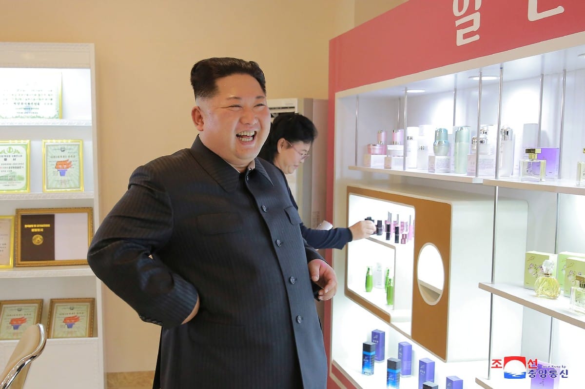 Kim Jong Un appearance with wife at makeup factory in North Korea
