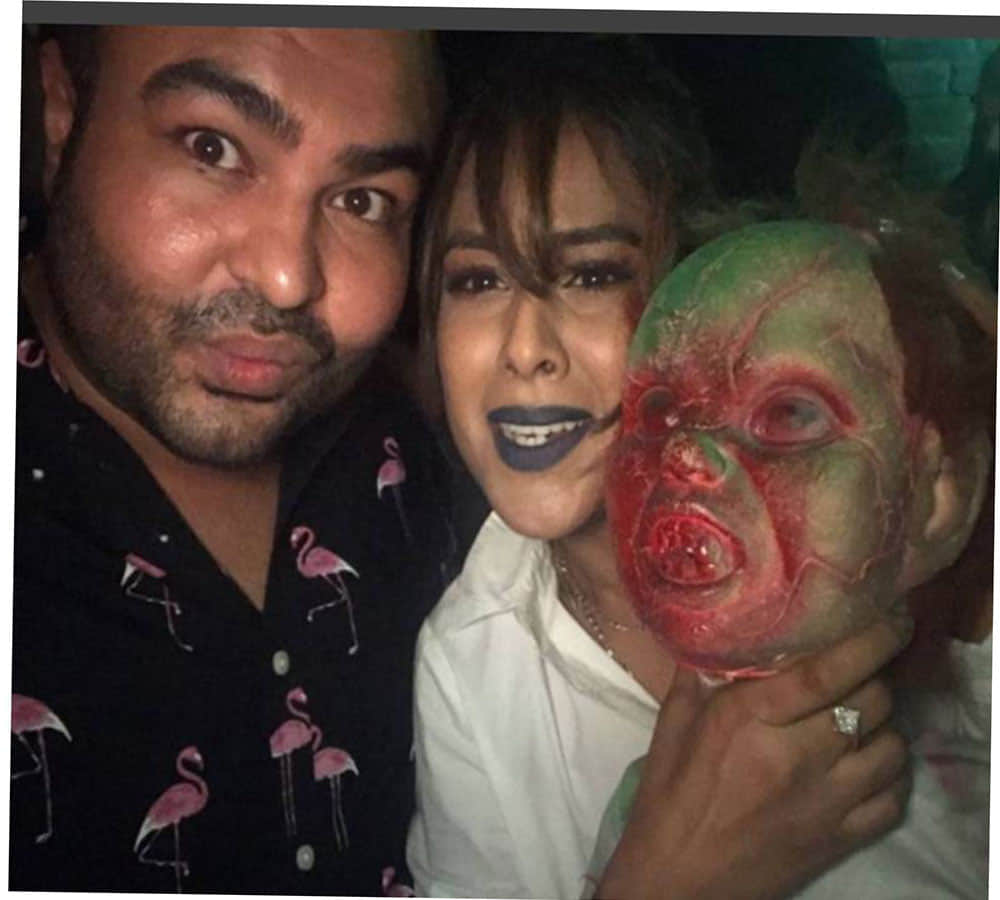 tv actress Nia Sharma photoshoot with blue lipstick