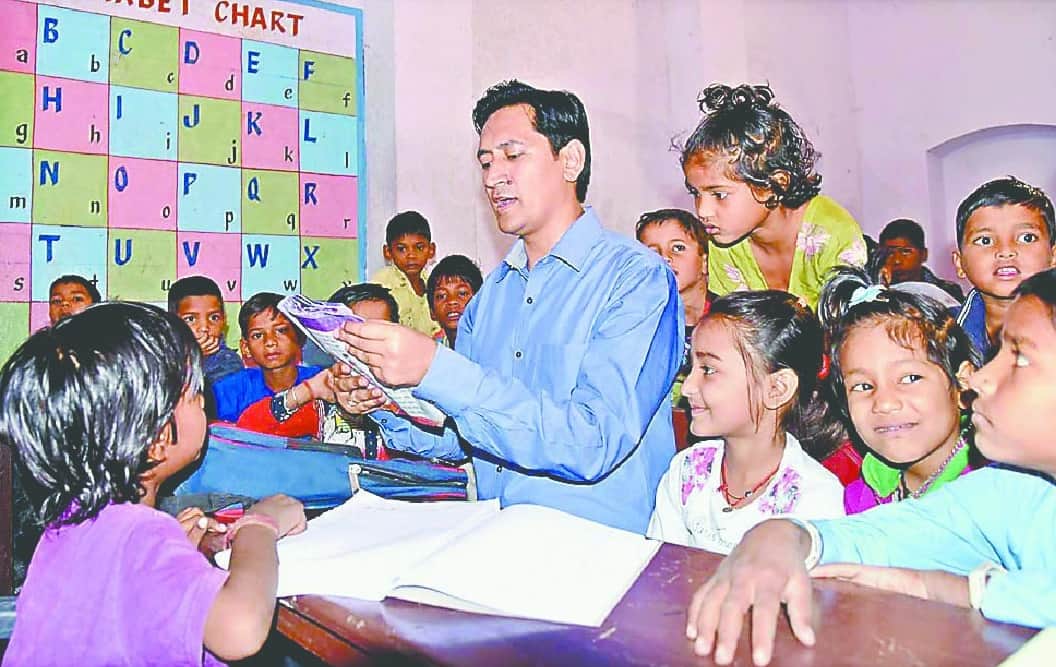 IAS deepak rawat teach students in haridwar school