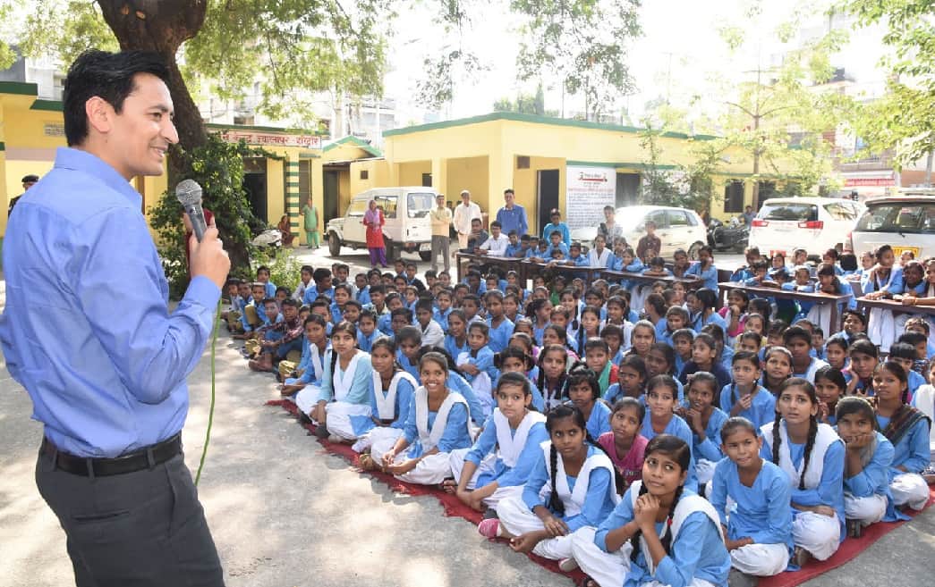 IAS deepak rawat teach students in haridwar school
