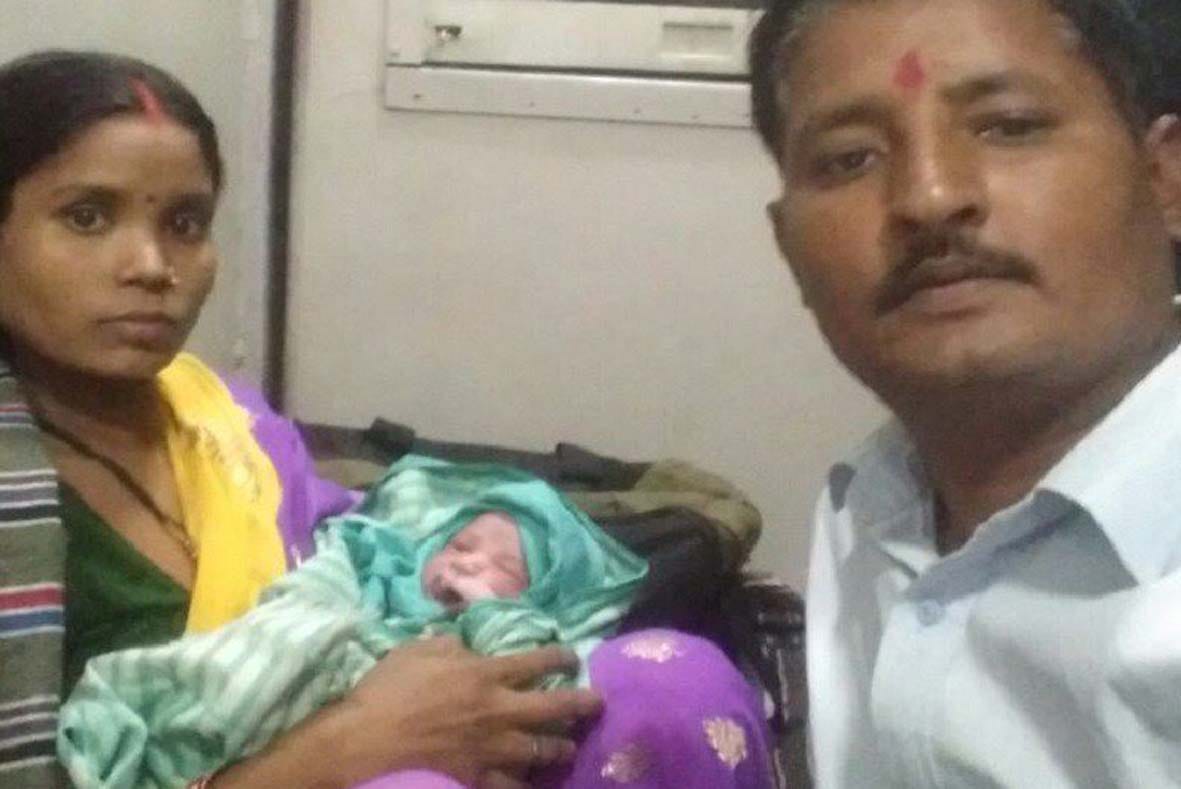 NDRF personnel help pregnant lady in running train