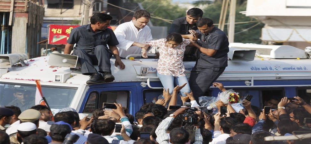girl climbed rahul gandhis van for selfie in bharuch rally 