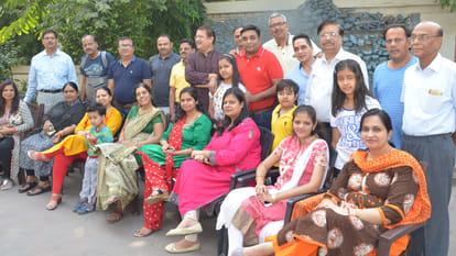 happy family is Anand Palace Apartment