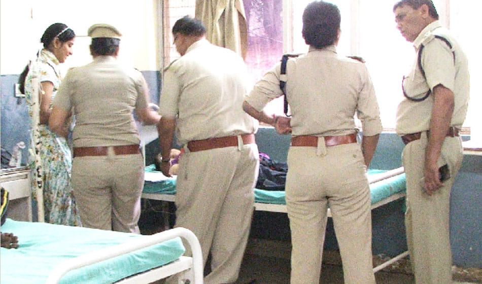 woman accused a baba to molest and grab land took poison in police station 