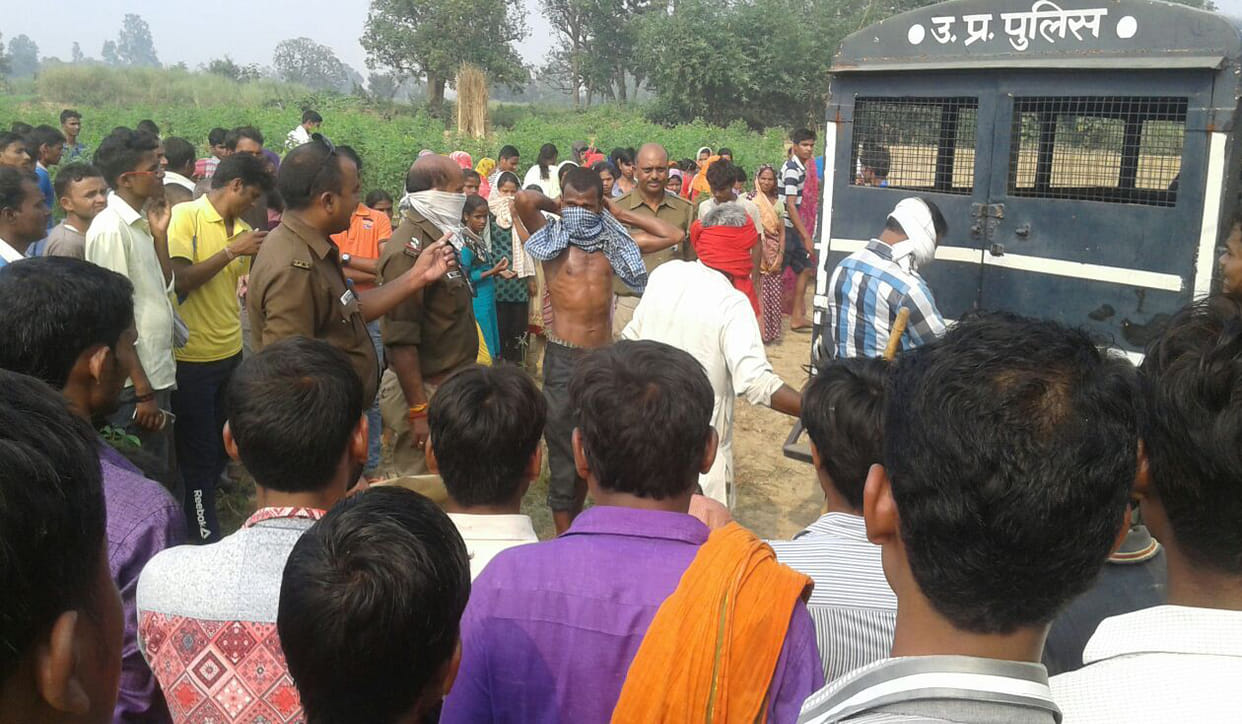 a youth body found  in field