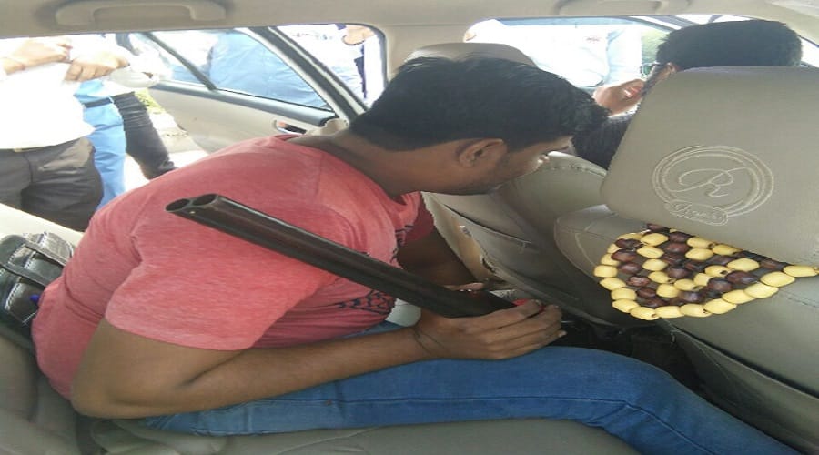 Drove the gun on tax demand, beaten toll worker