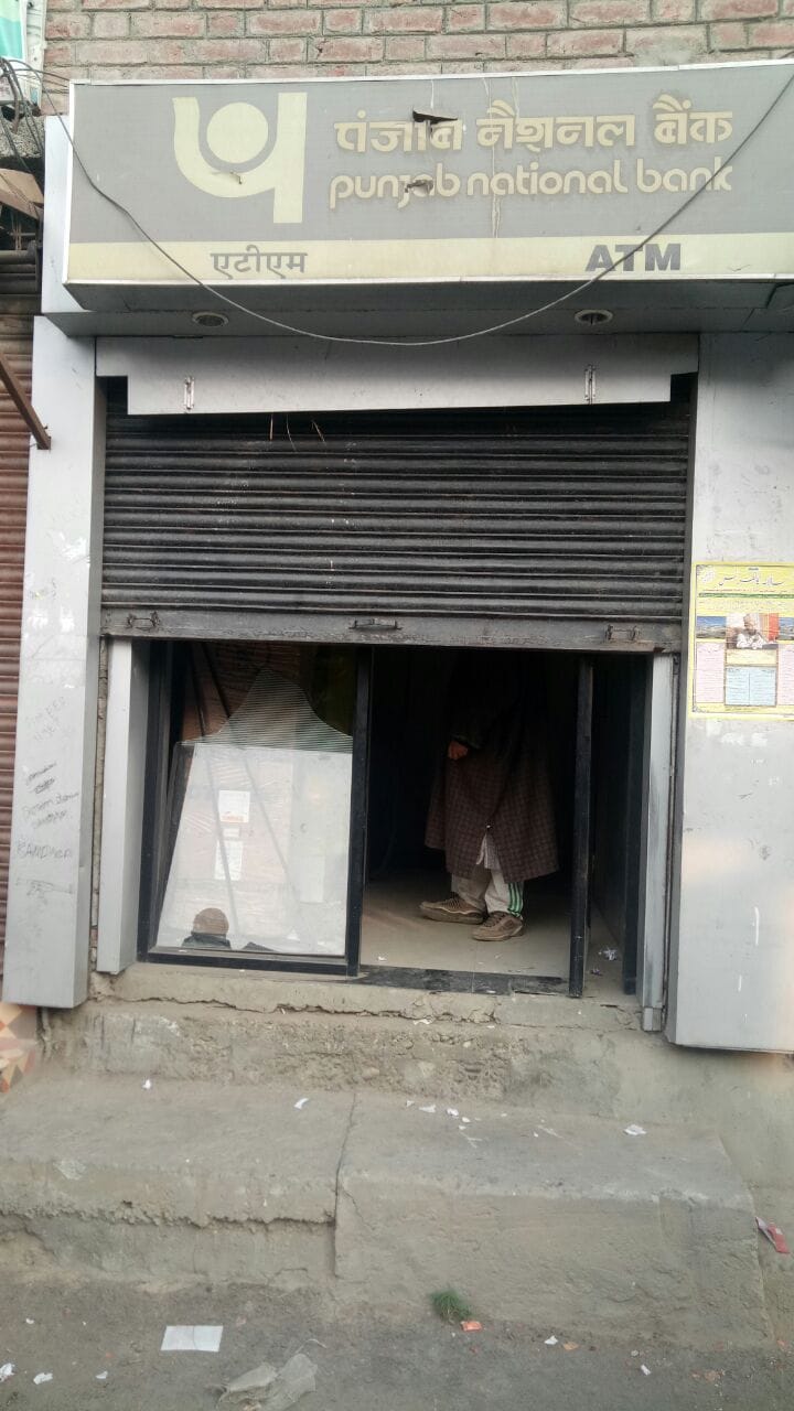 pnb atm machine stolen in pulwama rajpora