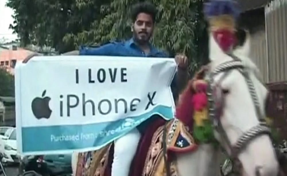 Man rides horse with dhol to purchase iPhone X 