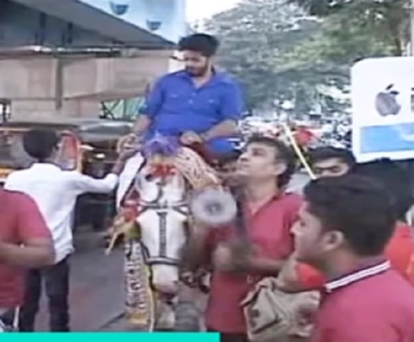 Man rides horse with dhol to purchase iPhone X 
