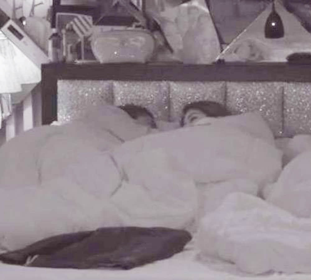 fans angry on puneesh and bandagi liplock scene bigg boss show