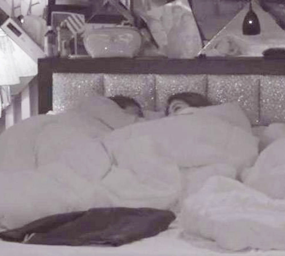 fans angry on puneesh and bandagi liplock scene bigg boss show