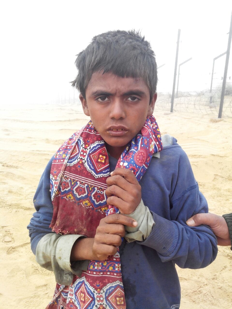 bsf apprehended 12 year old pak boy from border area released him after flag meeting 