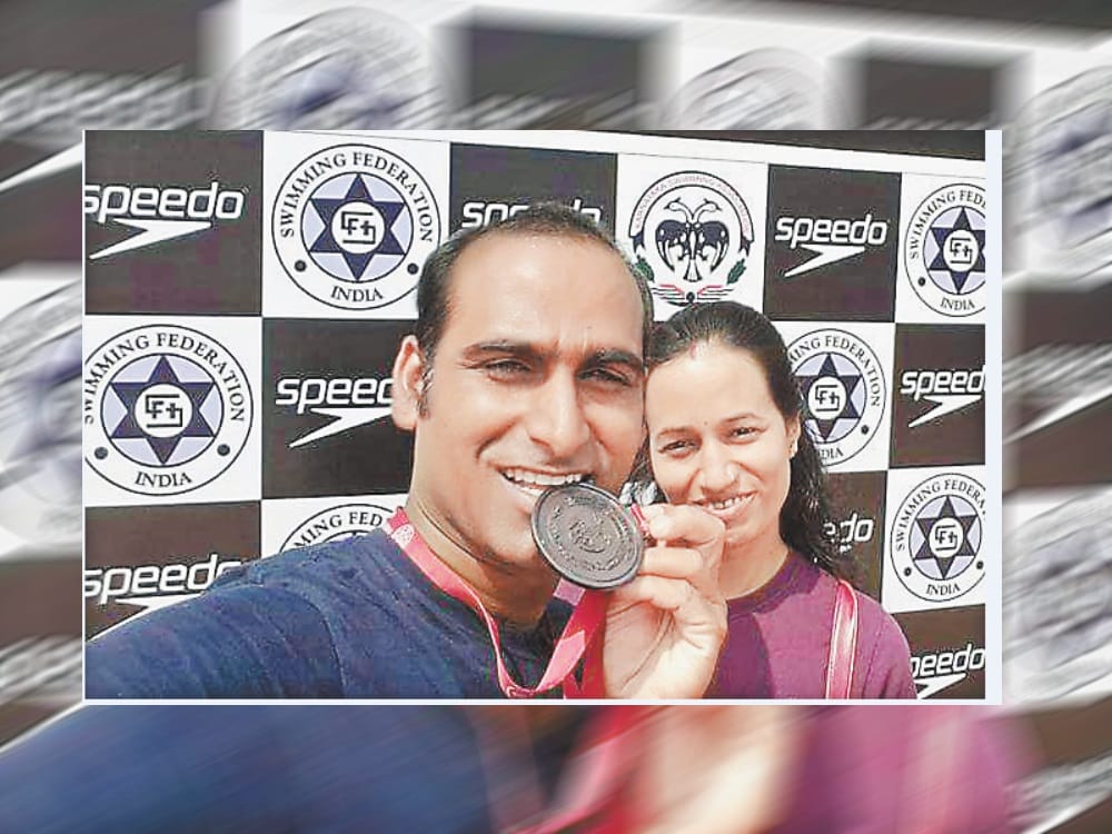 samandar singh won bronze medal in national swimming compitition