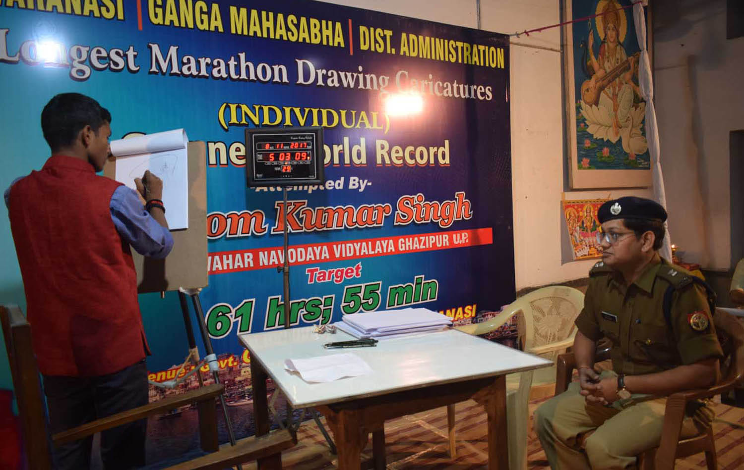 ghazipur son hari om start world longest drawing caricature in varanasi