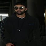 ranbir kapoor returns mumbai, but not alone with a mystery girl