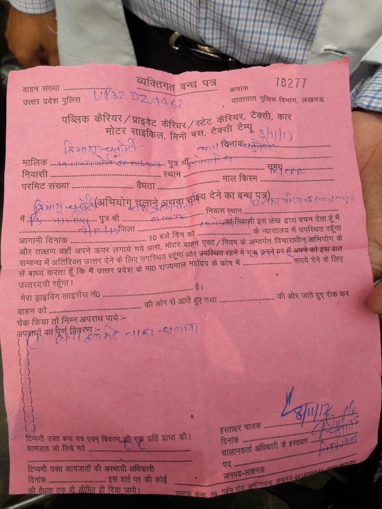 doctor fined for not wearing helmet while driving a car