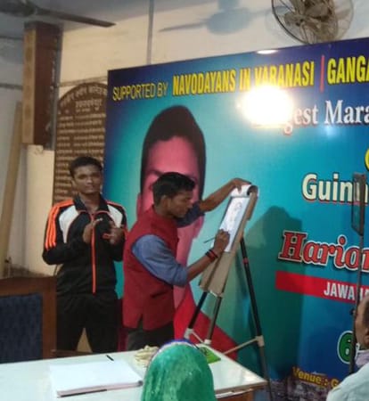 hari om make world record for longest marathon drawing caricature