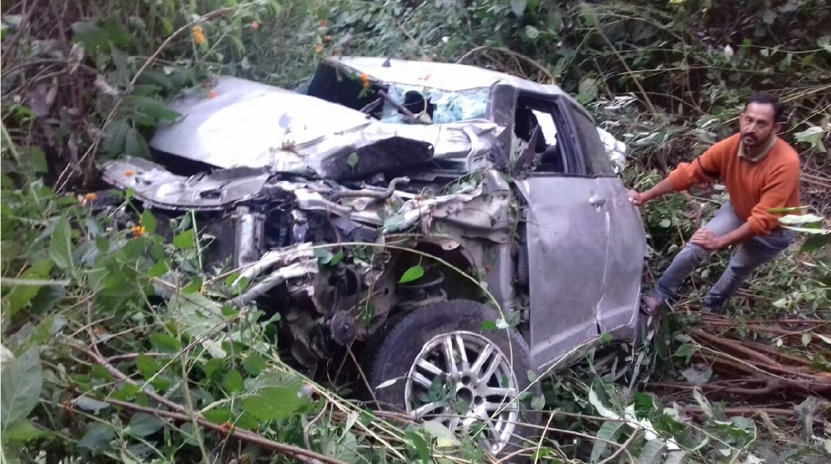 Dividers collide with car, four injured