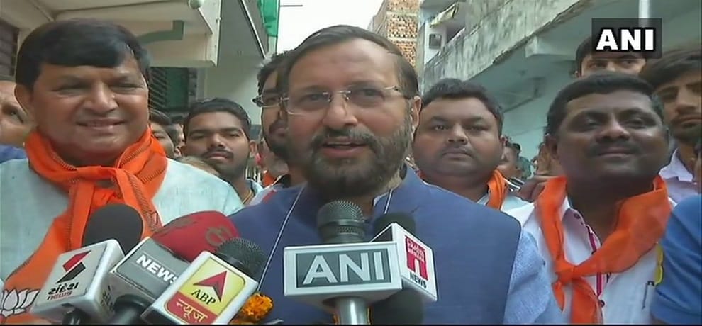 gujarat election bjp minister prakash Javadekar campaigning door-to-door in gujarat