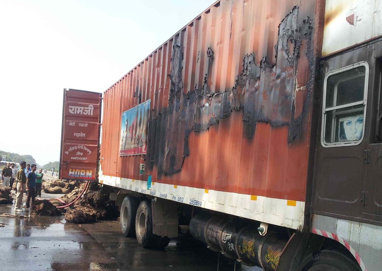 Running container caught fire at national highway