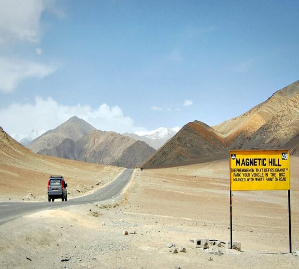 car climb up itself on Magnetic hill in leh