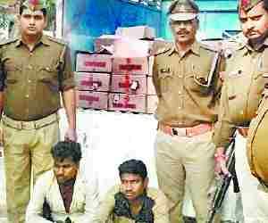 Liquor seized, two held