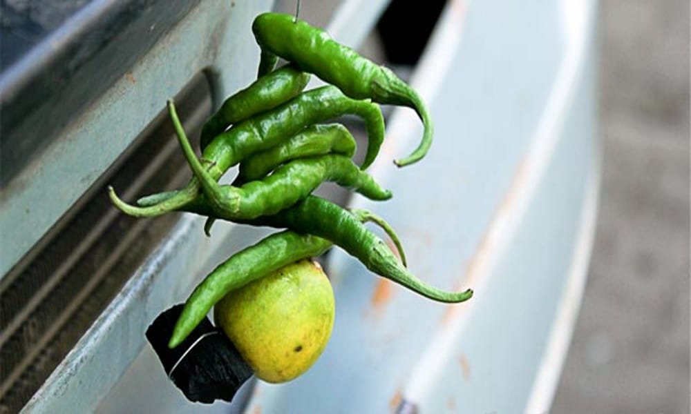  know about the scientific reason of hanging lemon and chilli in front of door