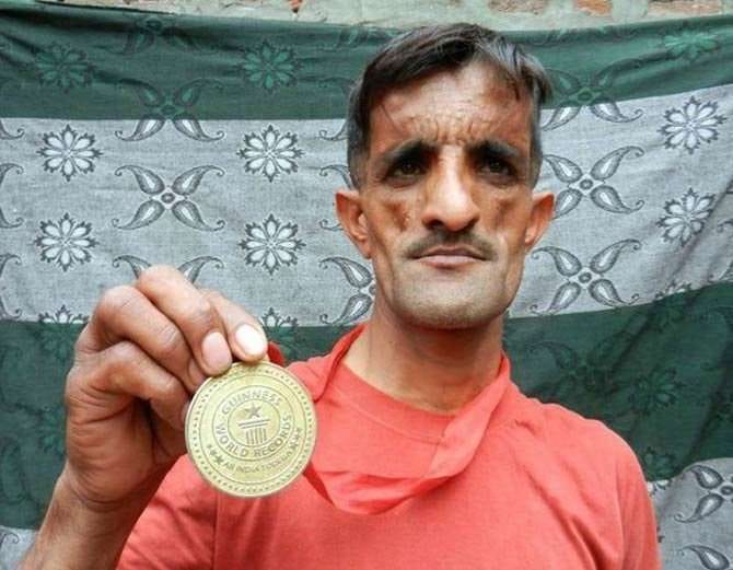 weird stories, unique people, indian rubber man rammehar punia bizarre record in guinness book