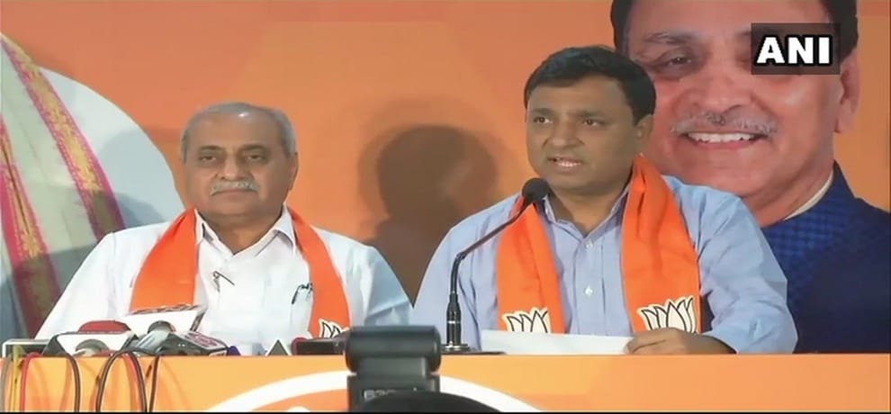Former Patidar eader Chirag Patel joins BJP in presence of Gujarat Deputy CM Nitin Patel