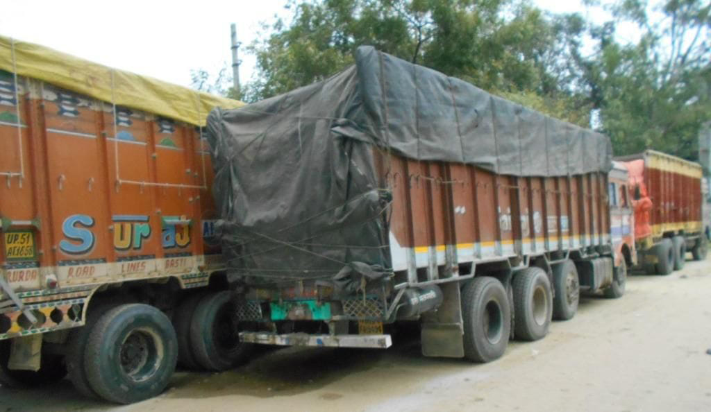 11 truck full of sand caught