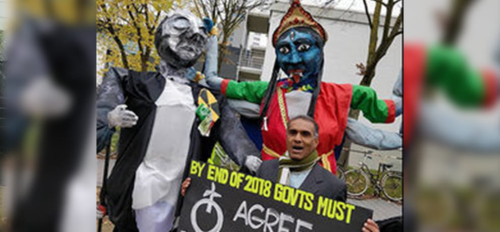 against pollution people protest with kali maa statue in germany at Eco friendly summit